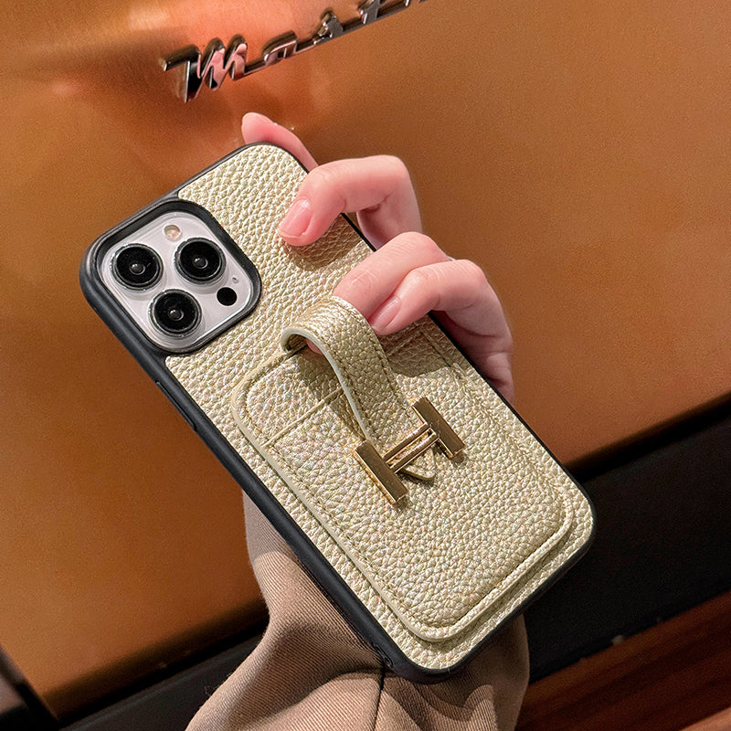 Skórzane etui na iPhone'a z uchwytem na kartę H