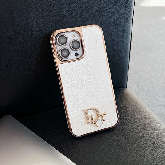 Capa para iPhone em ouro rosa com logotipo de diamante da moda