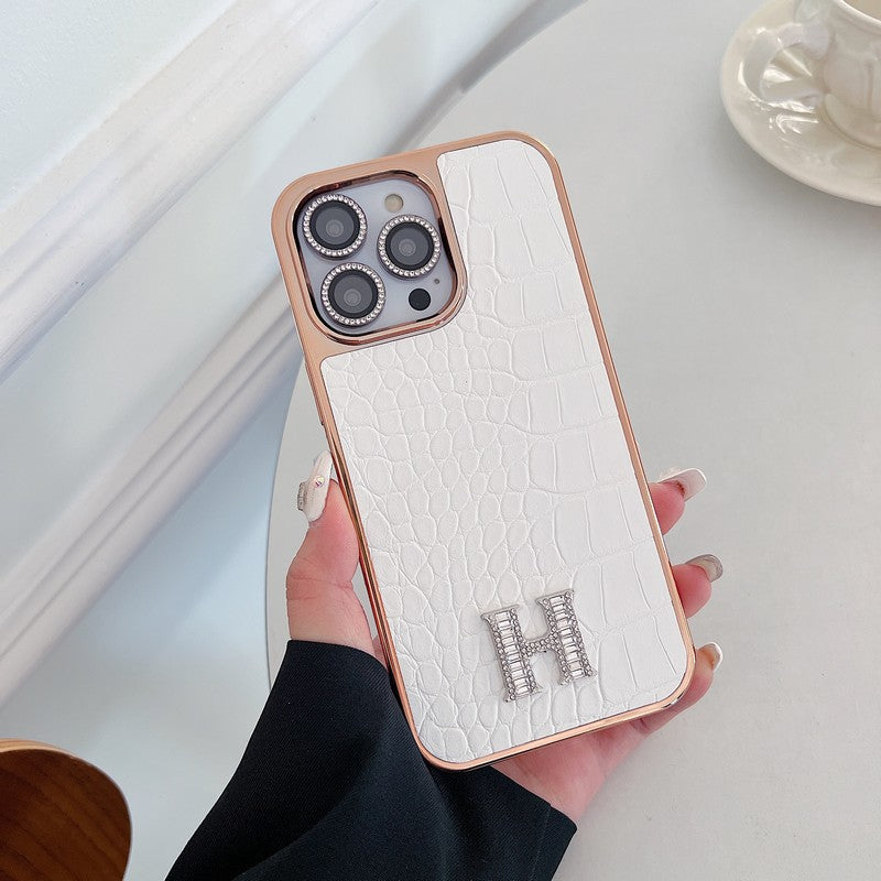 Klasyczne etui na iPhone'a z logo w kształcie diamentu w kolorze różowego złota