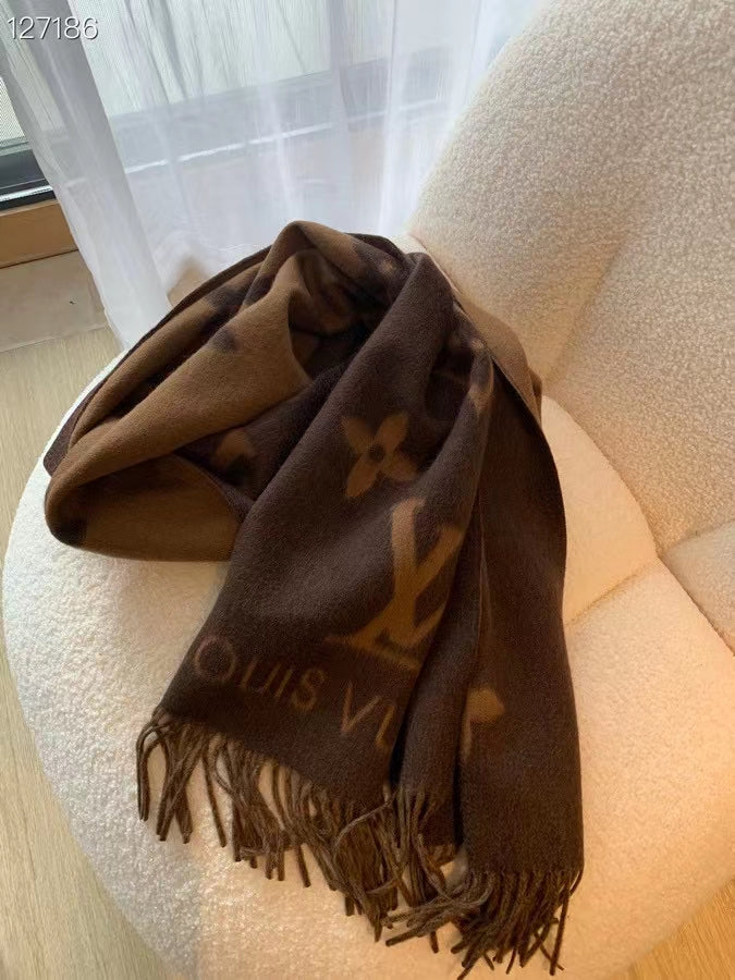 Chocolate-colored monogram large shawl is here,