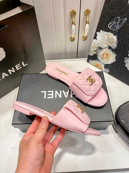 Luxury diamond-quilted flat slides with metal embellishments