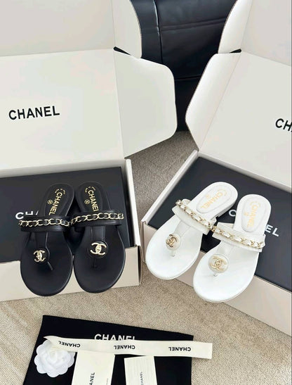 Luxury diamond-quilted flat slides with metal embellishments