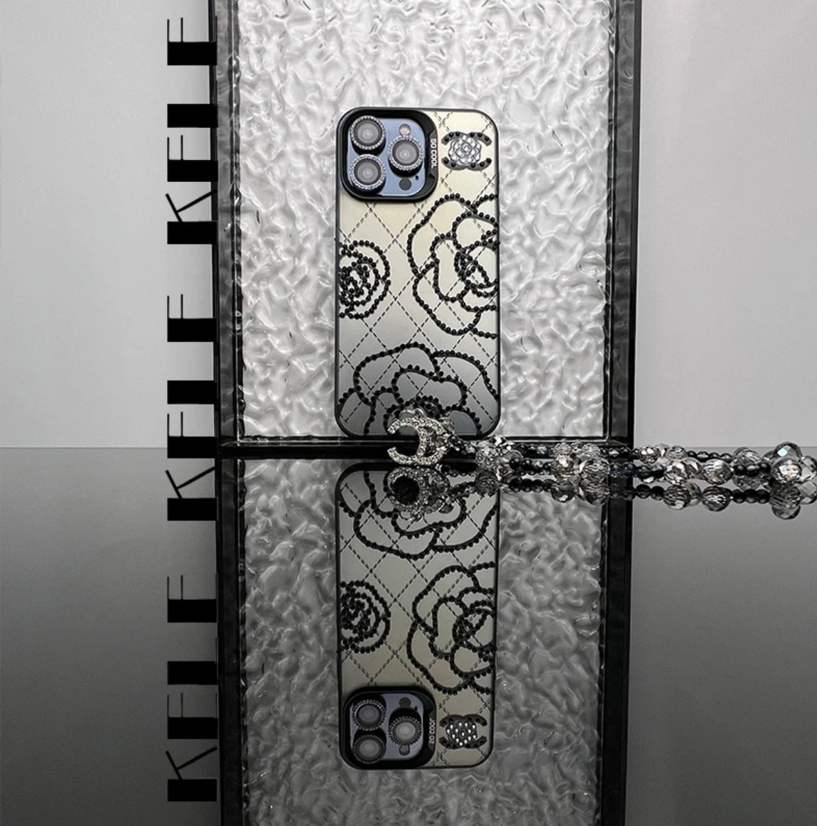 CAMELLIA-INSPIRERT IPHONE-ETEKSKE MED UNIKT DESIGN