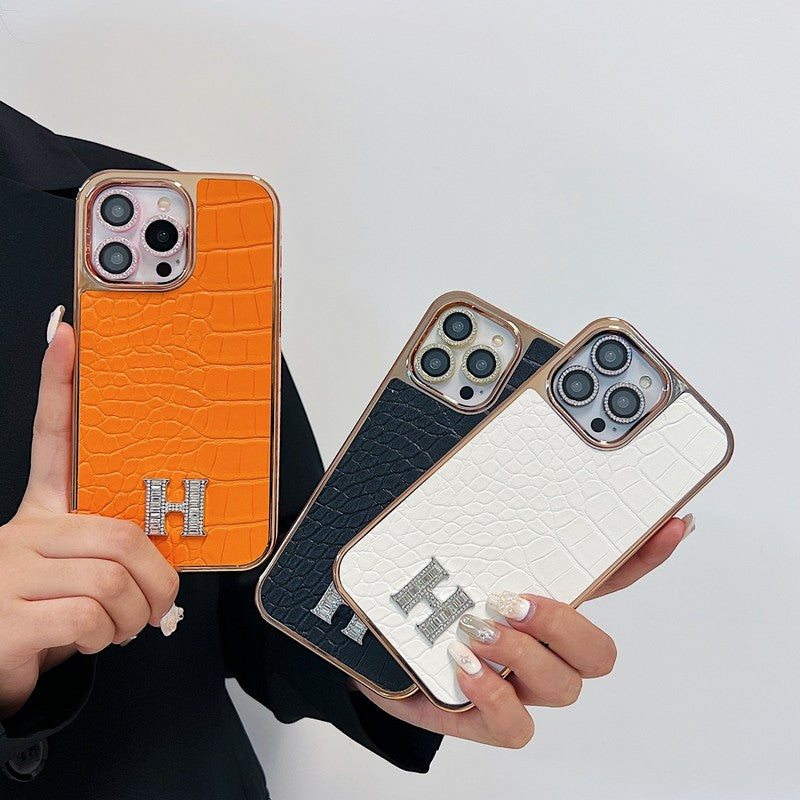 Klasyczne etui na iPhone'a z logo w kształcie diamentu w kolorze różowego złota