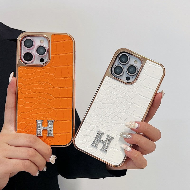 Klasyczne etui na iPhone'a z logo w kształcie diamentu w kolorze różowego złota