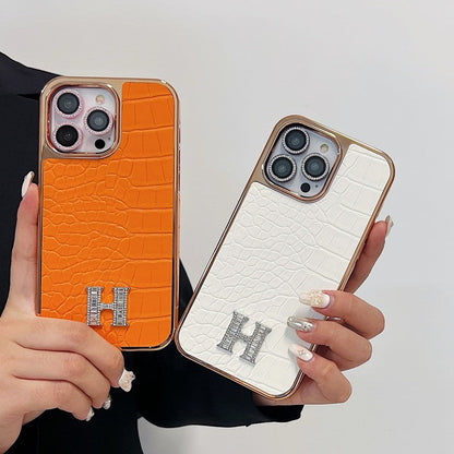 Klasyczne etui na iPhone'a z logo w kształcie diamentu w kolorze różowego złota