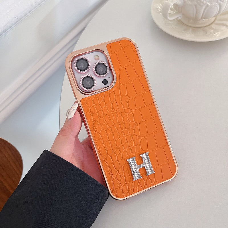 Klasyczne etui na iPhone'a z logo w kształcie diamentu w kolorze różowego złota