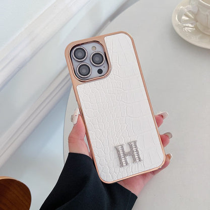 Klasyczne etui na iPhone'a z logo w kształcie diamentu w kolorze różowego złota