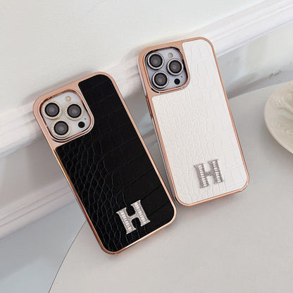 Klasyczne etui na iPhone'a z logo w kształcie diamentu w kolorze różowego złota