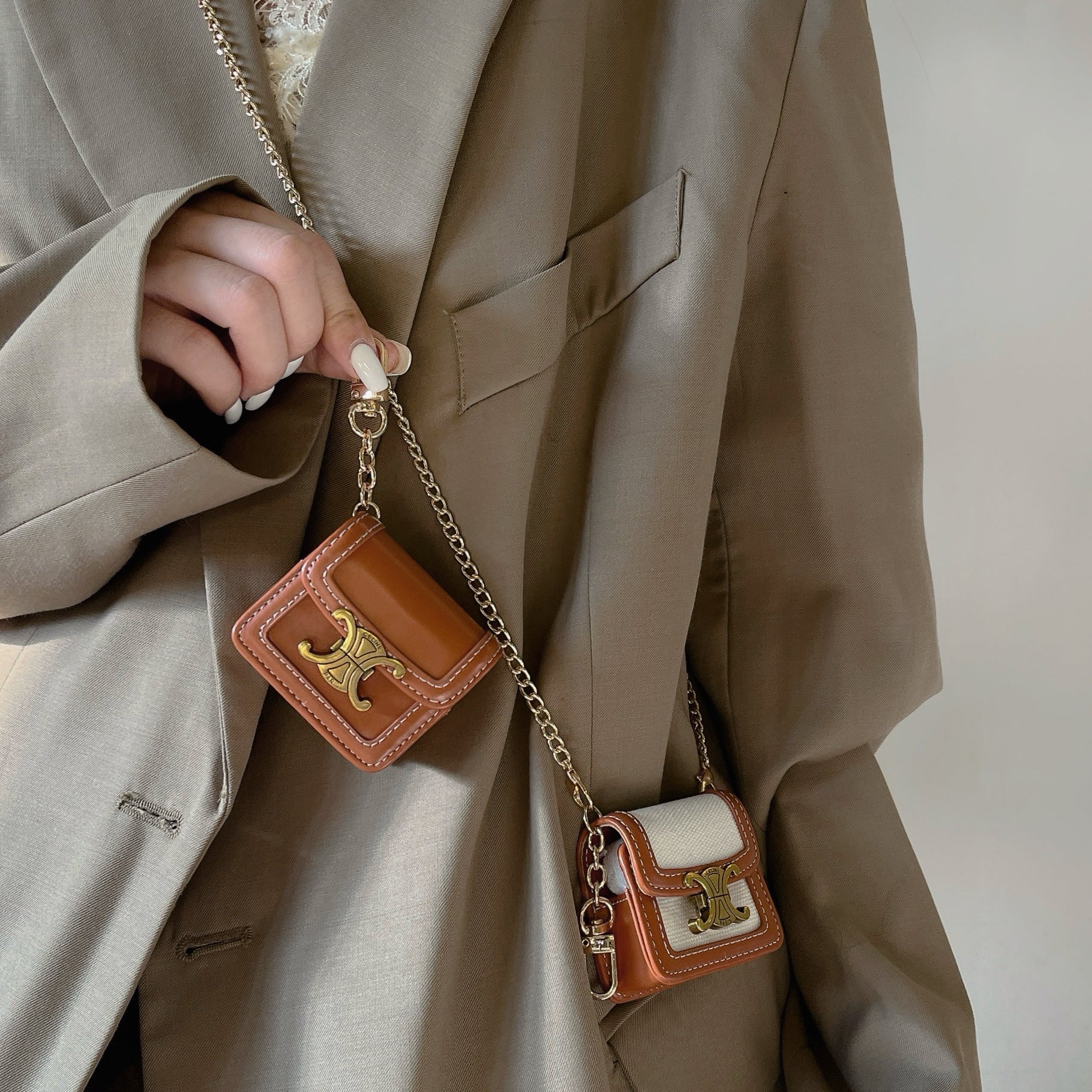 Luxury Leather Keychain AirPods Case with Gold Hardware